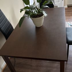 Dark brown dining table