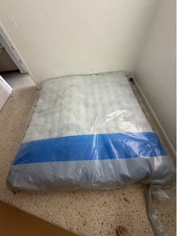 KING SIZE PILLOW TOP MATTRESS BRAND NEW IN ORIGINAL PLASTIC PURCHASED FROM MATTRESSES FIRM ALSO COMES WITH THE FRAME BRAND NEW FACTORY SEALED PURCHASE