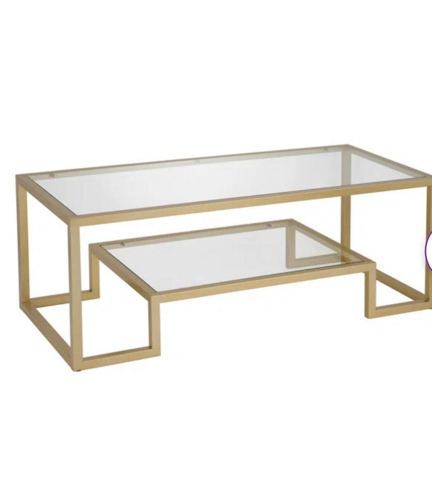 Glass coffee table w/ gold trim