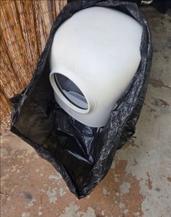 Arenero automatico para gato.