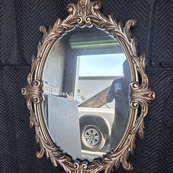 Big wall golden mirror