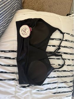 Swim top size medium with tabs
