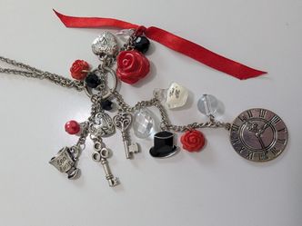 21.5" length necklace silver tone lots of charms