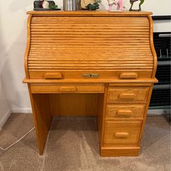 Winners Only roll top desk.