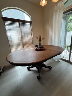 Round Sunburst Wood Pedestal Dining Table with Claw Feet