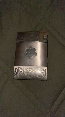 This is a vintage Elgin American magic, action light L Natick it’s a cigarette case and lighter combination. They were popular in  The 1