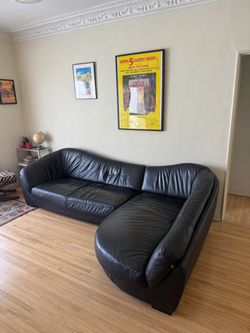 Black leather L Shaped Couch