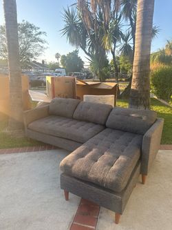 Charcoal grey small sofa