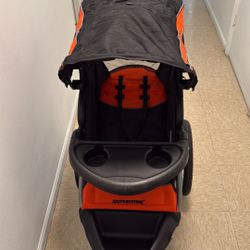Baby Trend Expedition Jogger Travel System, Millennium Orange.