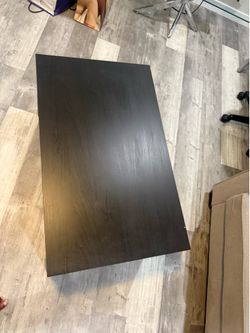 Brown wooden coffee table