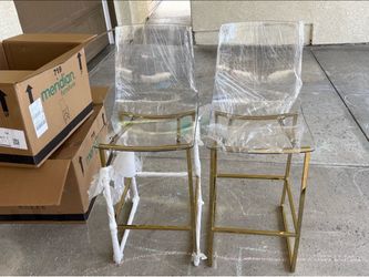 Clear gold bar chairs