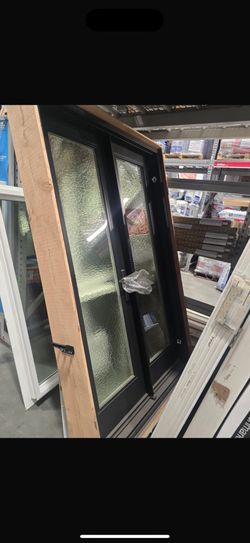 Pre-hung exterior Double door with decorative glass inserts. 