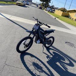 Legal Surron with Dual Sport helmet (Gt300 Tank Pro)