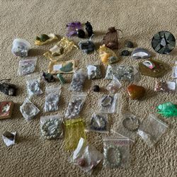 Various Crystals, Rings, And Other Stones
