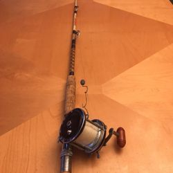 Penn Senator Special Reel 4/0 W/ 6’ 5” Hurricane fishing rod, specifically the 11-7 6/0 DX model, made by Spinmaster Rod Company in Miami, Florida. It