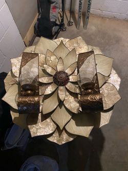 Hanging art with sconces