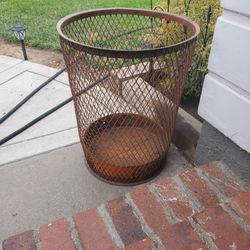Antique industrial mesh trash can