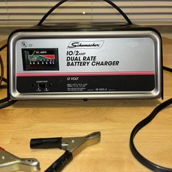Schumacher SE-1010-2, a 10/2 Amp Dual Rate Manual Battery Charger designed for 12-volt lead-acid batteries. Excellent Condition, works Great. USA Made
