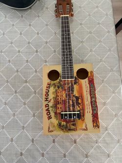 This is the original, “Roadhouse” cigar box uke that Eddy Finn