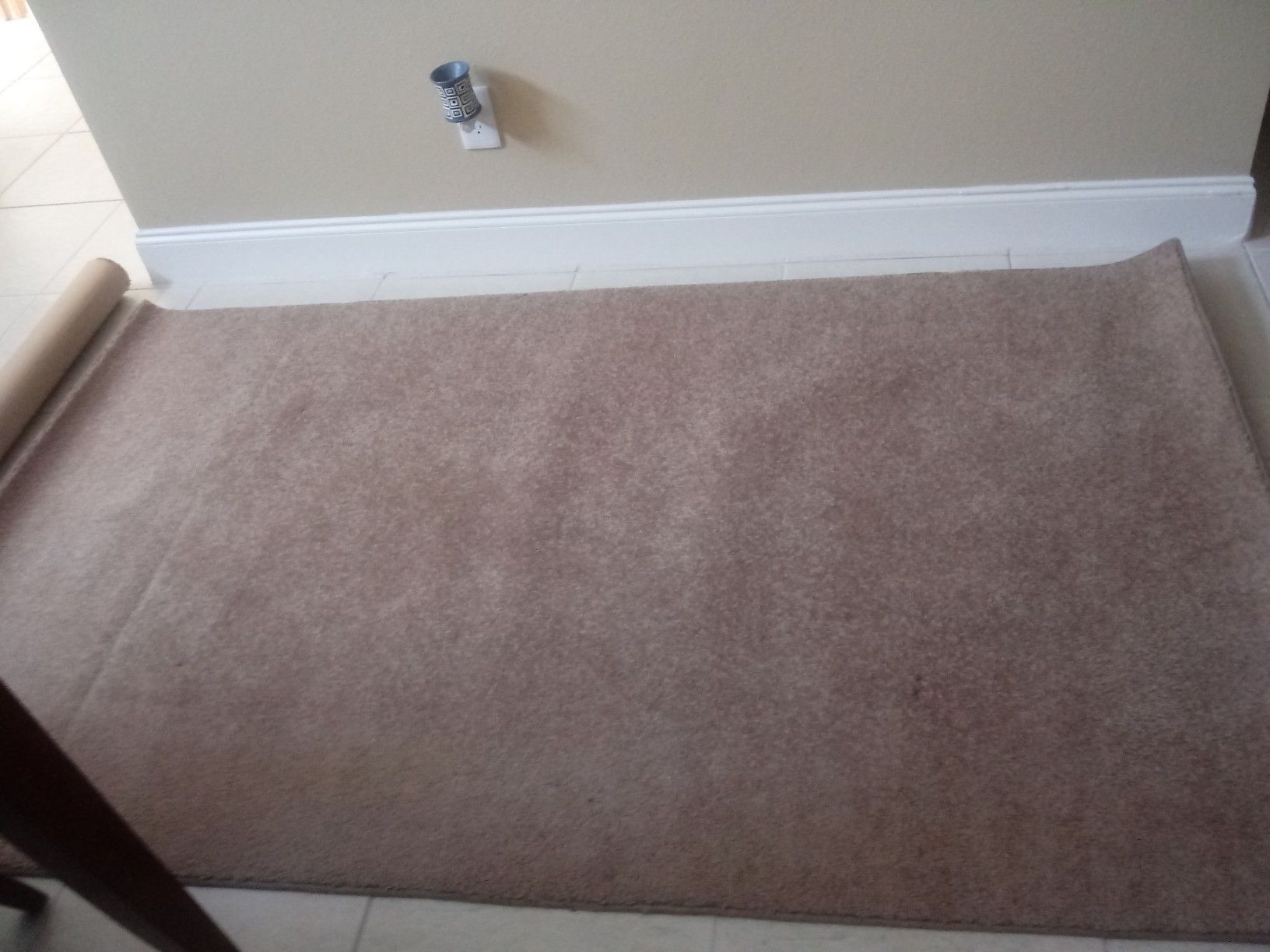 Beige area rug