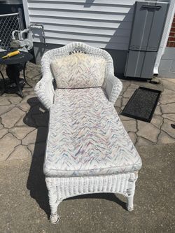 Wicker lawn chair with cushions