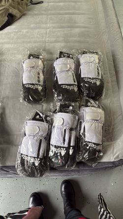 Brand new Snow mittens (gloves) - black and white sizes - small - medium - large