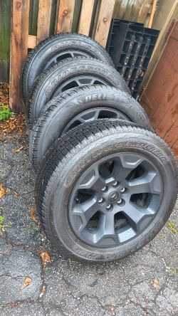 Ram 1500 black wheels and tires