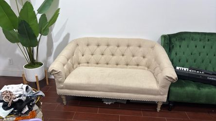 Beige Tufted Loveseat with Nailhead Trim