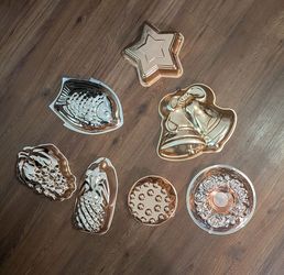 Mid century anodized copper Jello molds.