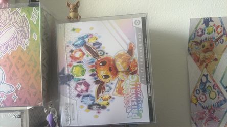 Pokémon Scarlet & Violet Prismatic Evolutions Elite Trainer Box with plastic case