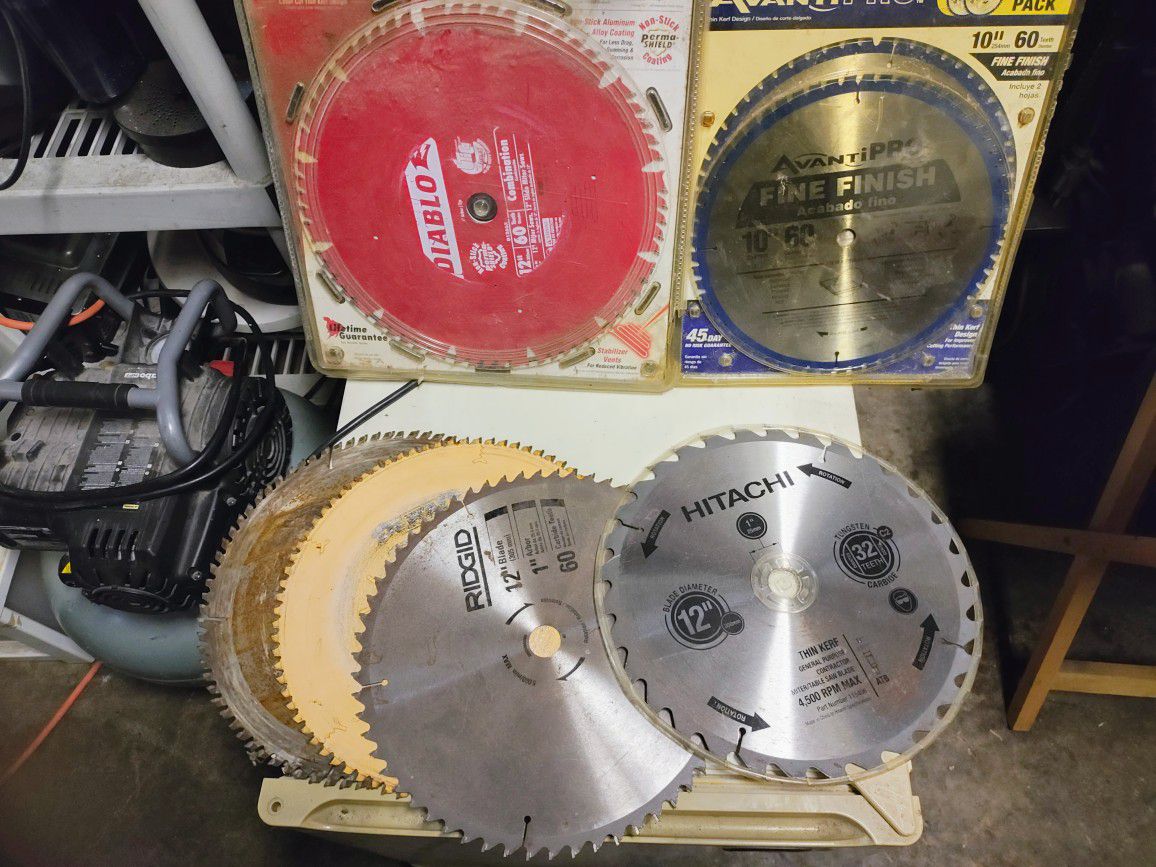 Various 12 Inch And 10 Inch Saw Blades 