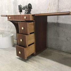 Stunning Mid Century Modern Sewing Machine With Chrome Hardware.