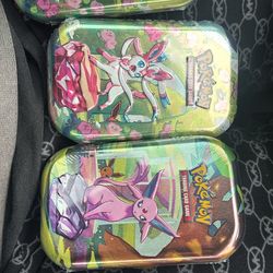Pokemon Prismatic Tins