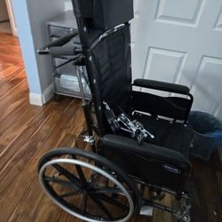 Reclining Wheelchair With Extendable Footrests