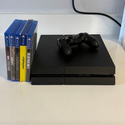 PS4 with controller and 5 games. 500GB capacity .  All cables included