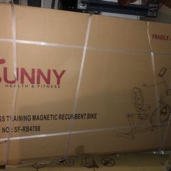Brand New. Sunny Health & Fitness SF-RB4708 Cross Training Magnetic Recumbent Bike
