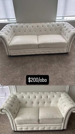 White tufted sofa and love seat