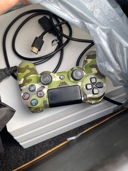 PS4 w/ controller, HDMI, and power cord