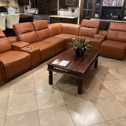 New 4 PWR/2 Console 8 Piece Reclining Sectional.  Genuine Italian Leather.  153x126x31/39H.  Free Delivery!
