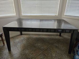 5 foot dining table.  Also has a leaf, to make longer. Only 4 years old, bought at Macy's  for 6 hundred.