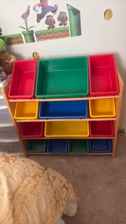 Children's storage bins in solid wood holder