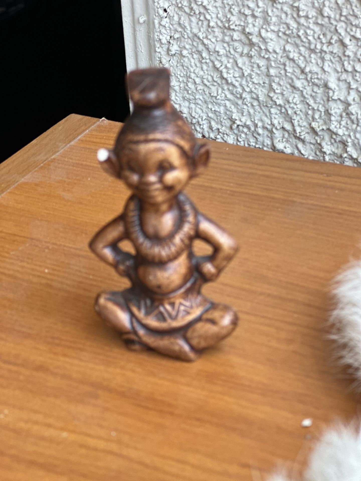 Menehune figurines are