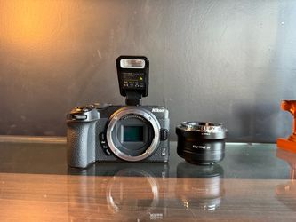 NIKON ZR LENS AND FLASH READY TO SHOOT