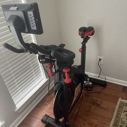 New exercise bike one still in box, one Assembled