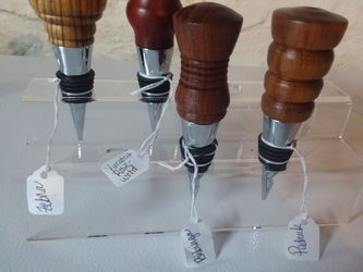 HAND-TURNED wine stoppers **$30.00**EACH