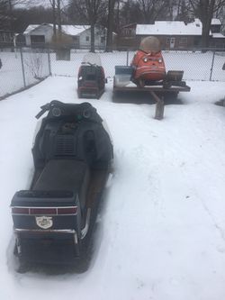 3 Snowmobiles.