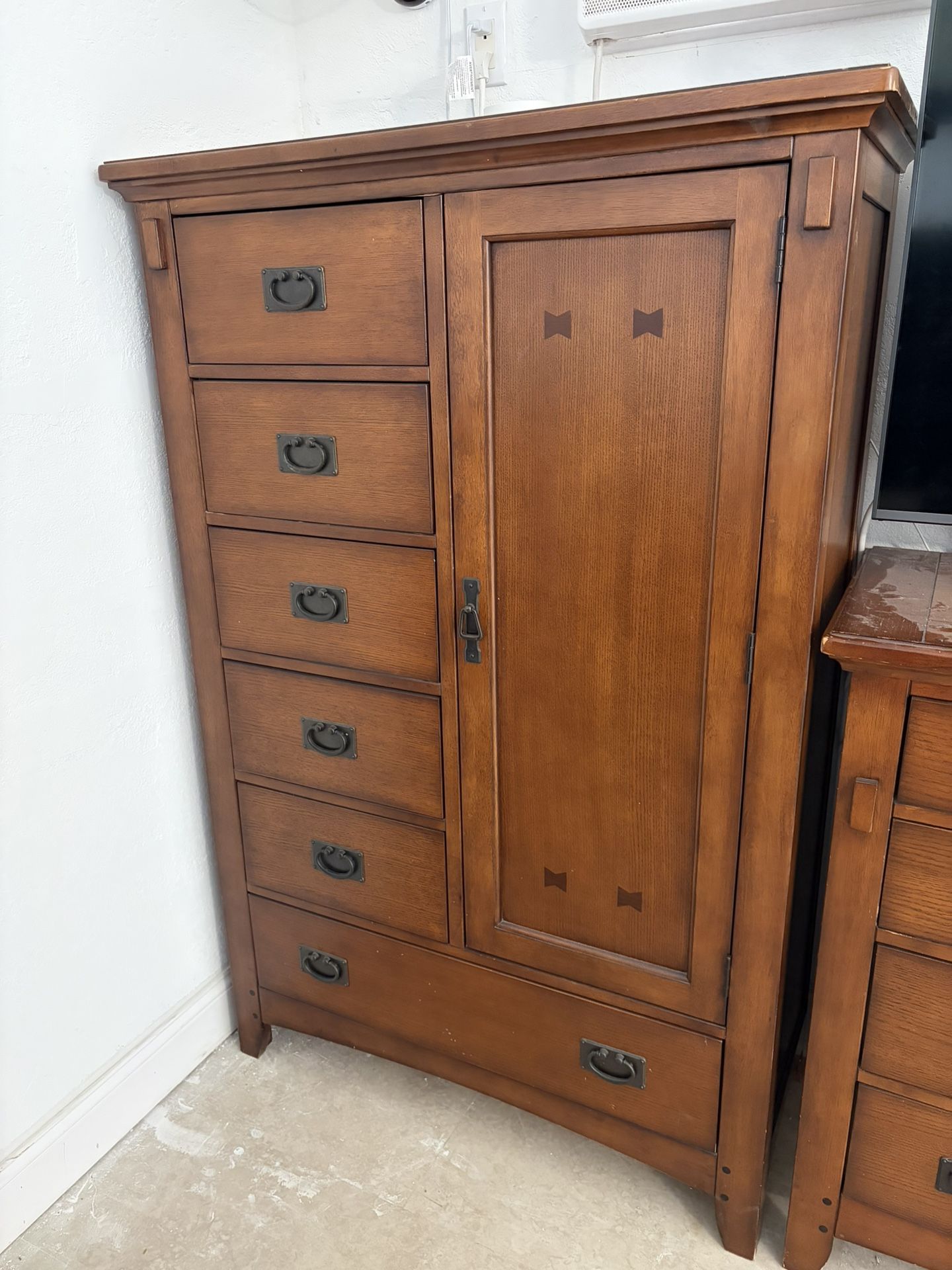 Dresser, nightstand, and armoire with mirror.