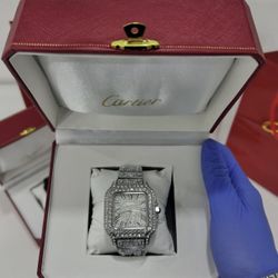 Silver Cartier Watch.