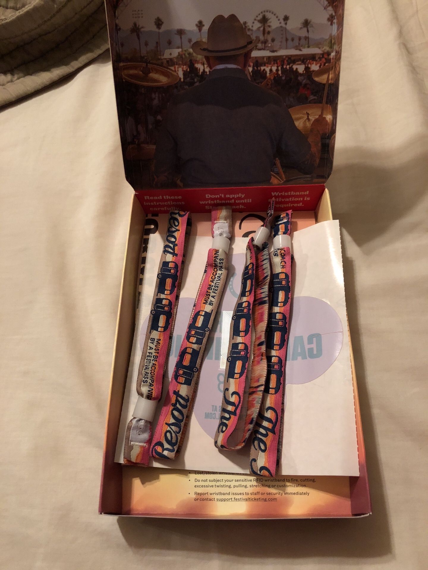 Stagecoach car camping spot with 4 RV Resort wristbands
