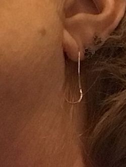 Single 14 karat gold chain earring